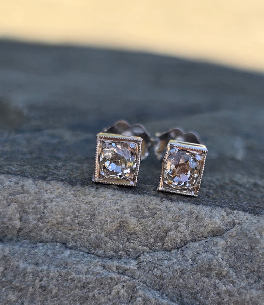 Platinum top - 14k gold old mine cut diamond studs earrings - apx .64ct tw