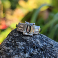 Platinum emerald cut diamond engagement ring