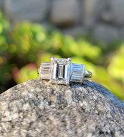 Platinum emerald cut diamond engagement ring