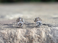 14k white gold diamond bezel stud earrings - .24ct tw