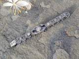 18k white gold c.1920's Deco filigree diamond & blue sapphire bracelet