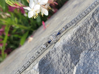 18k white gold c.1920's Deco filigree diamond & blue sapphire bracelet