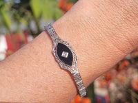 14k white gold c.1920's Deco filigree diamond & black onyx bracelet