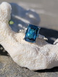 Platinum emerald cut blue zircon & baguette diamond estate ring