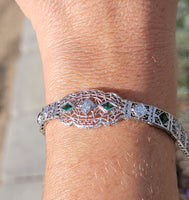 14k white gold c.1920's Deco filigree diamond & emerald bracelet