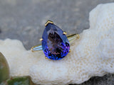 18k gold pear cut tanzanite and baguette diamond estate ring