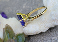 18k gold pear cut tanzanite and baguette diamond estate ring