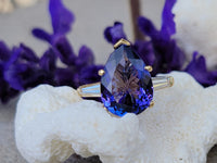 18k gold pear cut tanzanite and baguette diamond estate ring