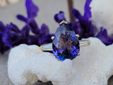 18k gold pear cut tanzanite and baguette diamond estate ring