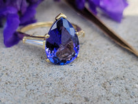 18k gold pear cut tanzanite and baguette diamond estate ring