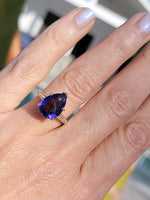 18k gold pear cut tanzanite and baguette diamond estate ring