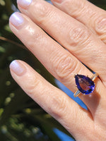 18k gold pear cut tanzanite and baguette diamond estate ring