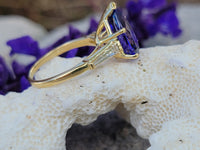 18k gold pear cut tanzanite and baguette diamond estate ring