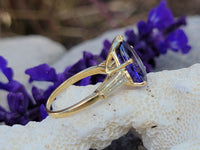 18k gold pear cut tanzanite and baguette diamond estate ring