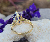 18k gold pear cut tanzanite and baguette diamond estate ring