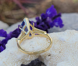 18k gold pear cut tanzanite and baguette diamond estate ring