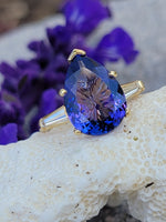 18k gold pear cut tanzanite and baguette diamond estate ring