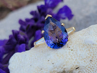 18k gold pear cut tanzanite and baguette diamond estate ring