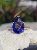 18k gold pear cut tanzanite and baguette diamond estate ring