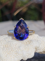 18k gold pear cut tanzanite and baguette diamond estate ring