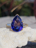 18k gold pear cut tanzanite and baguette diamond estate ring