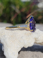 18k gold pear cut tanzanite and baguette diamond estate ring