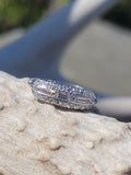 Platinum baguette & round diamond vintage wedding band