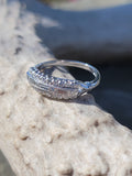 Platinum baguette & round diamond vintage wedding band
