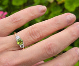 14k gold two tone peridot & diamond 3-stone ring