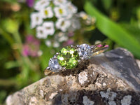 14k gold two tone peridot & diamond 3-stone ring