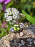 14k gold two tone peridot & diamond 3-stone ring