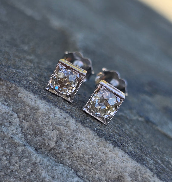Platinum top - 14k gold old mine cut diamond studs earrings - apx .70ct tw
