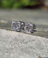 Platinum top - 14k gold old mine cut diamond studs earrings - apx .64ct tw