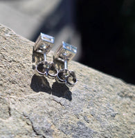 Platinum top - 14k gold old mine cut diamond studs earrings - apx .64ct tw