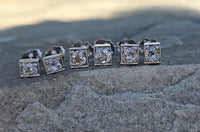 Platinum top - 14k gold old mine cut diamond studs earrings - apx .64ct tw