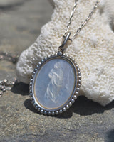 Platinum & 18ct two tone carved religious & seed pearl estate necklace pendant