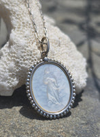 Platinum & 18ct two tone carved religious & seed pearl estate necklace pendant