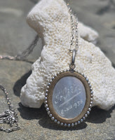 Platinum & 18ct two tone carved religious & seed pearl estate necklace pendant