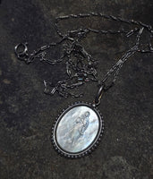 Platinum & 18ct two tone carved religious & seed pearl estate necklace pendant