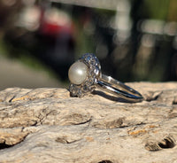 platinum diamond & pearl antique halo ring