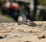 platinum diamond & pearl antique halo ring
