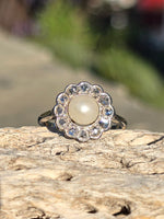 platinum diamond & pearl antique halo ring