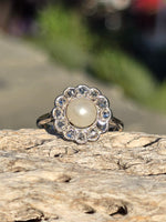 platinum diamond & pearl antique halo ring