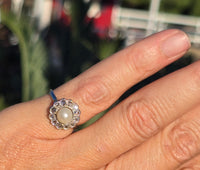 platinum diamond & pearl antique halo ring