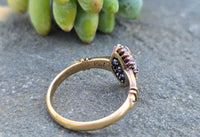 18k gold ruby and diamond antique shield glove navette ring