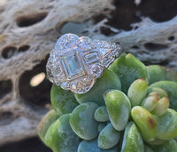 Palladium emerald cut diamond estate ring