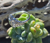Palladium emerald cut diamond estate ring