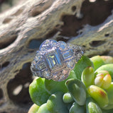 Palladium emerald cut diamond estate ring