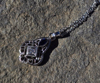 14k gold white gold sapphire and diamond Art Deco necklace pendant