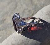 14k white gold c.1920's Art Deco garnet peacock filigree ring